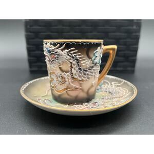 Dragonware Lustreware tea cup and saucer